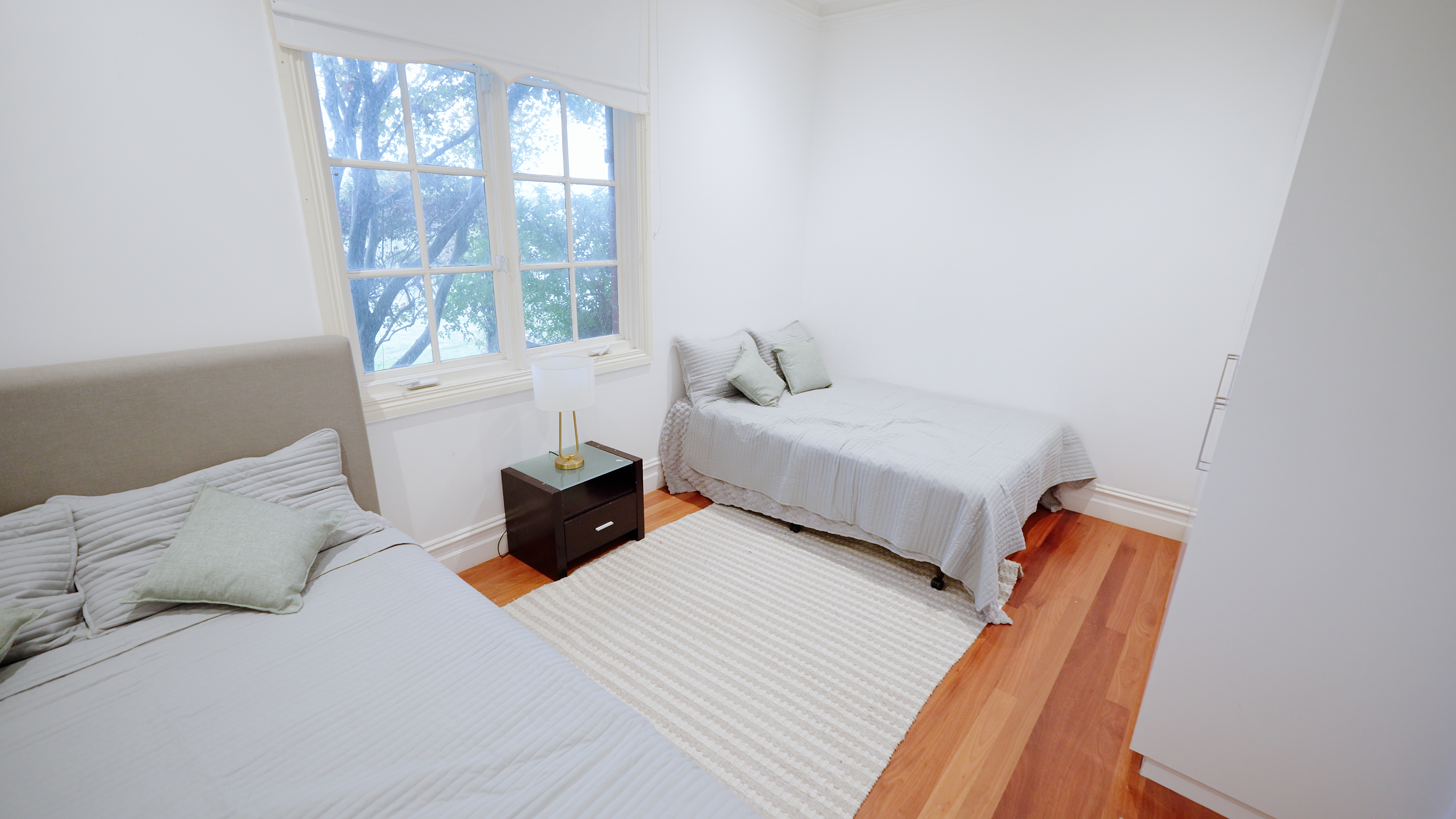 Twin room with garden views and natural light